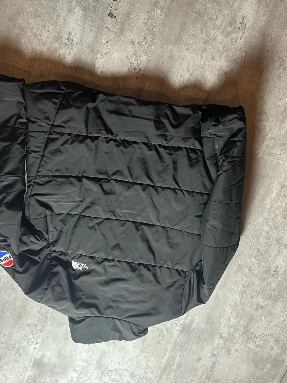 The North Face Black Quilted Puffer Jacket with Logo Patch